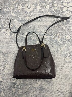 Coach Dark Brown Embossed Signature Satchel with Gold Hardware